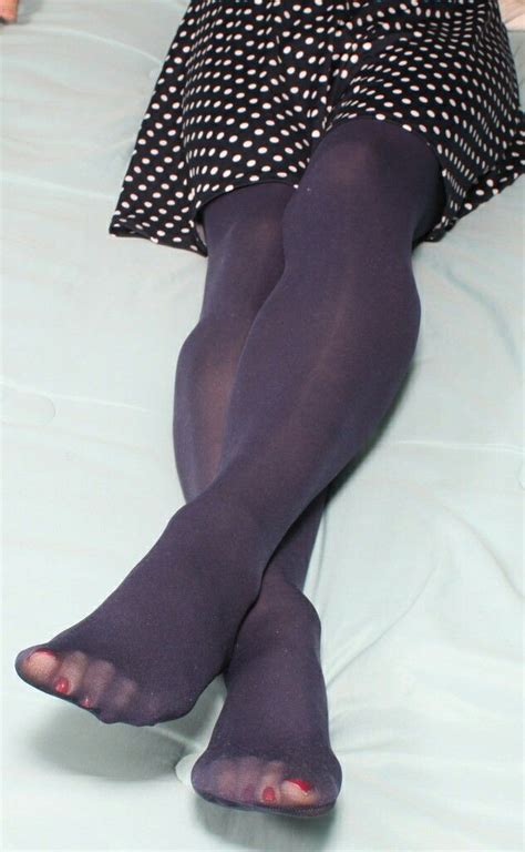 Feet in black tights 